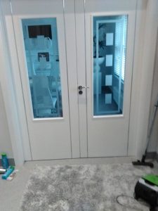 Double-White-doors-with-chrome-inlay-resized